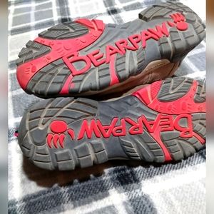 Hight top shoes for hiking these are Bearpaws size 11 in woman. Im a size 10 lol